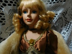 18 IN BLONDE PORCELAIN DOLL,COPPER SATIN LACE GOWN, PLUSH CAPE, HEADDRESS OR GREEN VELVET DOLL